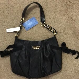 Vera Wang black purse, never used, still has tags